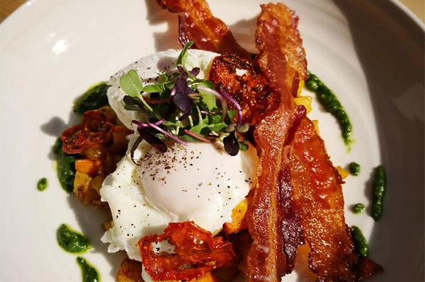 Cupanion's - Eggs, Hash, Kale, Bacon, Pesto | Photo: Facebook/cupanions | 4920 Roswell Rd Ste. 14, Sandy Springs, GA 30342