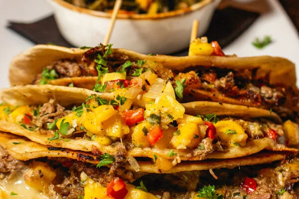 Confit & pulled duck tacos with peach salsa. | 1197 Peachtree Street Northeast Suite 517, Atlanta, GA 30305