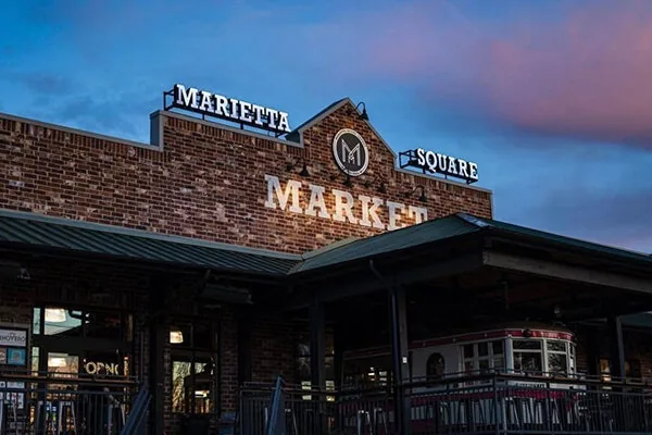 The exterior of the Marietta Square Market. | 68 North Marietta Pkwy NW, Marietta, GA 30060