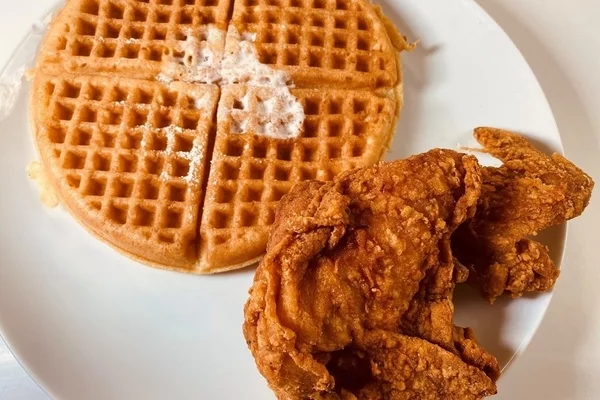 Johnny’s Chicken & Waffles- Chicken and waffles | Photo: Yelp.com | 3725 Main St, College Park, GA 30337