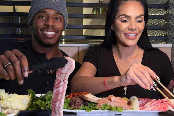 A couple enjoy Korean BBQ at Ssamjang Korean BBQ - 2860 Cumberland Mall Ste 1109, Atlanta, GA 30339