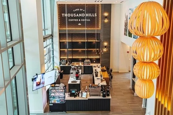 The interior of the midtown location of Land of a Thousand Hills Coffee. | Multiple Locations