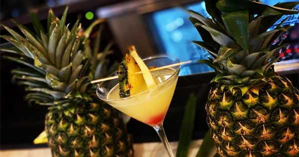 Negril Village - Pineapple Cosmo | Photo: Facebook/negrilvillageatl | 30 North Avenue NE, Atlanta, GA 30308