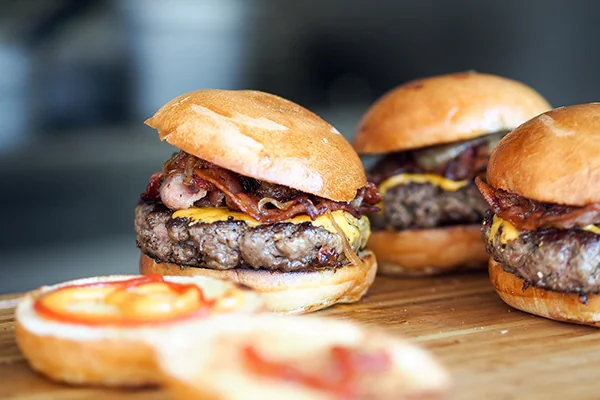 Burgers | Photo: threerosestavern.com | 105 N Park Square Marietta, GA 30060