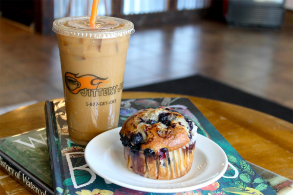 Muffin on dish with iced coffee in background | 181 Peachtree St, Atlanta, GA 30303