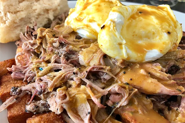 Pulled pork and eggs over potatoes | 197 Oak St, Athens, GA 30601