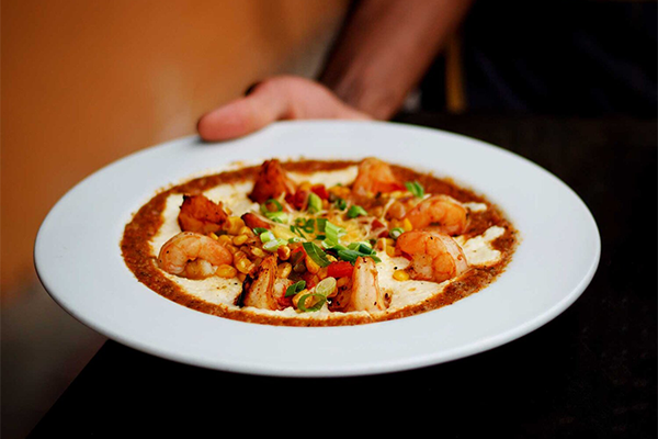 Plate of shrimp and grits | 229 E Broad St, Athens, GA 30608